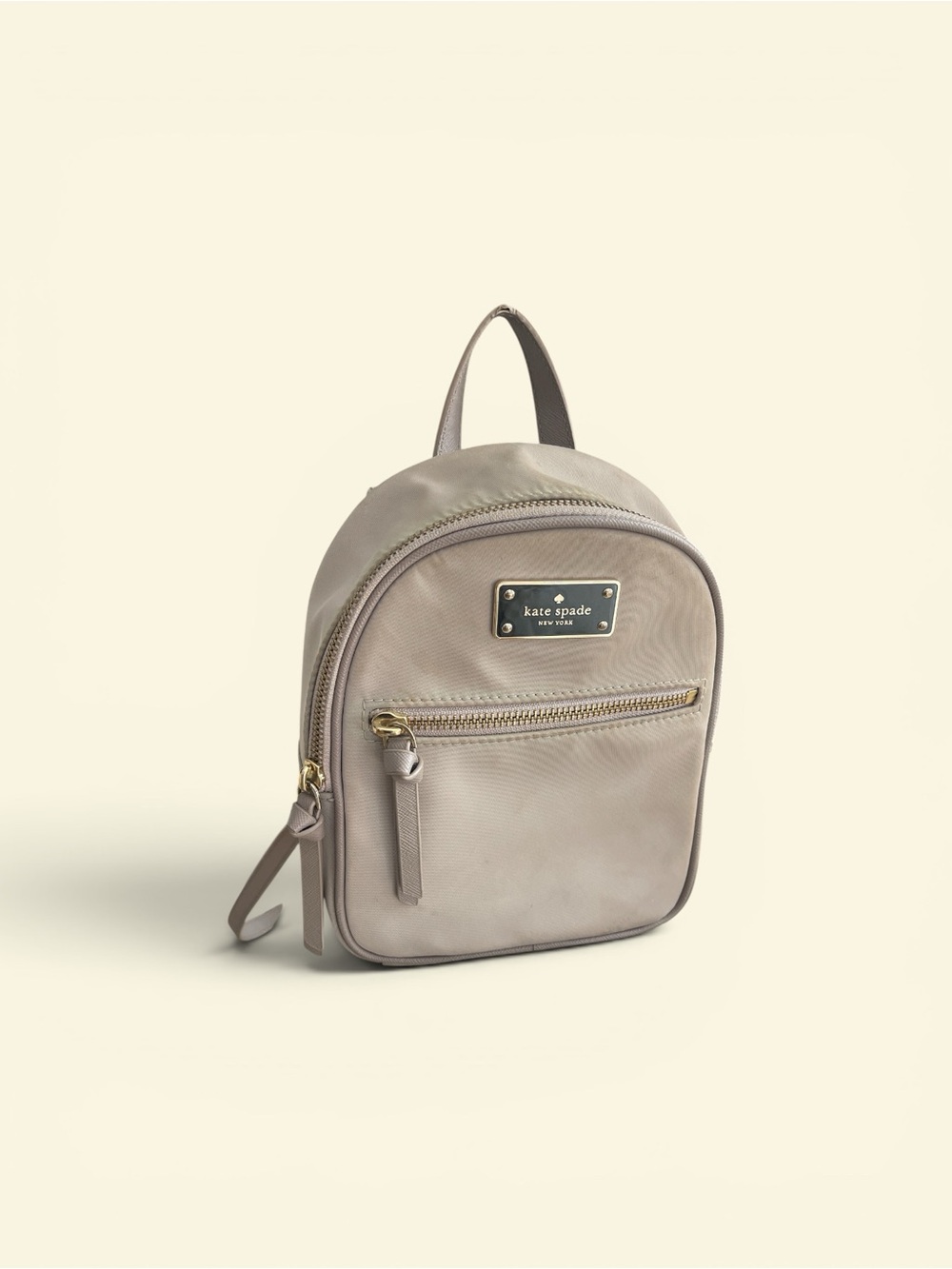 kate spade small taupe backpack